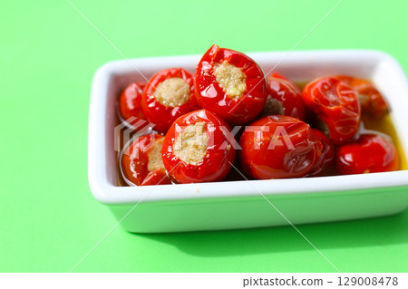 Tuffed cherry peppers with tuna preserved in olive oil Tuffed cherry peppers with tuna preserved in olive oil 129008478