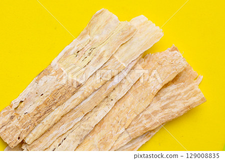 Dried slices of Radix Astragali, commonly used in traditional Chinese medicine. Dried slices of Radix Astragali, commonly used in traditional Chinese medicine. 129008835