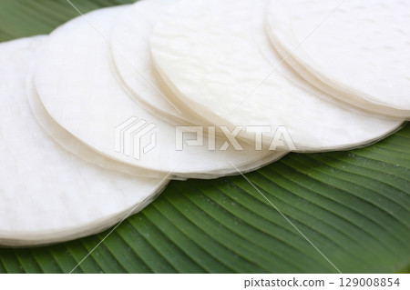 Stacked round sheets of Vietnamese rice paper 129008854