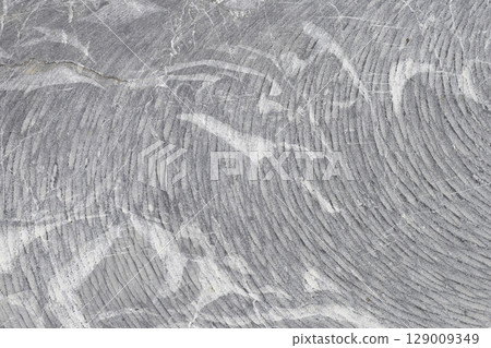 Grey rock surface with natural texture 129009349