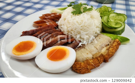 Thai Red Pork, Crispy Pork Belly, and Egg with Rice (Khao Moo Daeng Moo Krob Kai) Thai Red Pork, Crispy Pork Belly, and Egg with Rice (Khao Moo Daeng Moo Krob Kai) 129009842