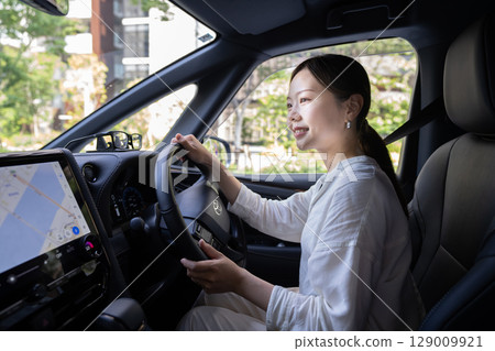 Safe driving female driver 129009921