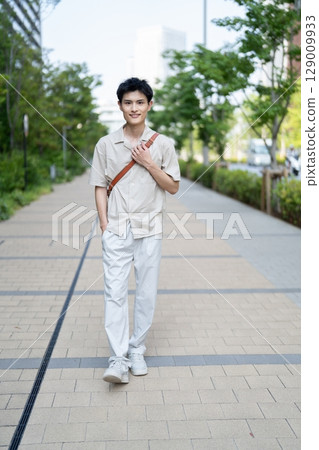 A young man with a smile 129009933