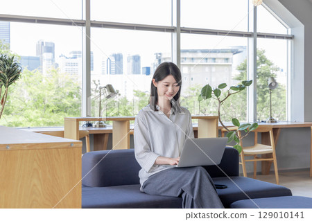 Young female cafe coworking share office Young female cafe coworking share office 129010141