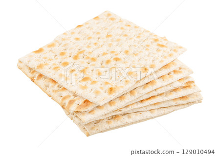 Stack of traditional Jewish matzo crackers for Passover, isolated on white background 129010494