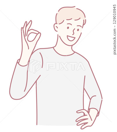 A Young Man Making an Okay Gesture with His Hand that Signifies Approval and Positivity 129010945