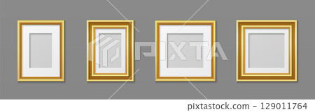 Gold photo frames collection on gray wall 129011764