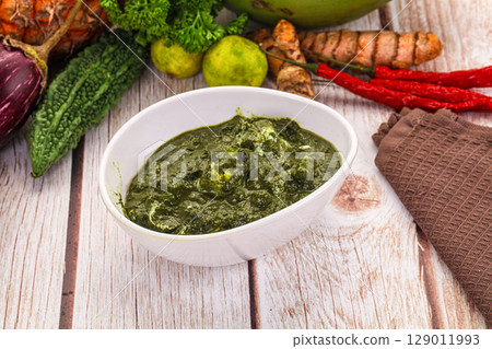 Indian cuisine - Palak paneer cheese with spinach 129011993