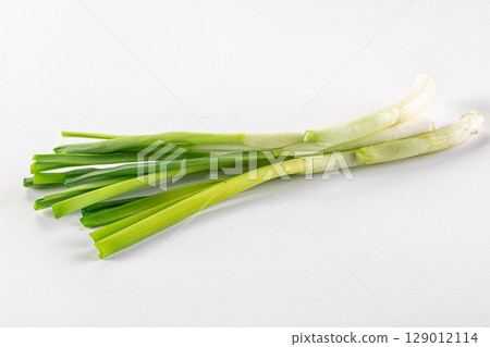 Young fresh juicy green onion Young fresh juicy green onion 129012114