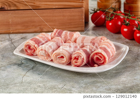 Raw bacon pork roll sliced Raw bacon pork roll sliced 129012140
