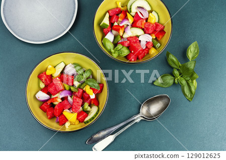 Refreshing watermelon cucumber salad. 129012625