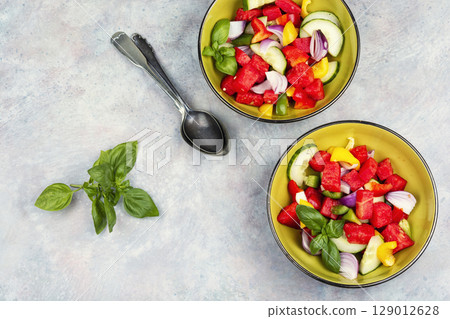 Original healthy salad of watermelon, cucumber. 129012628