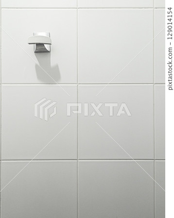 Minimal bathroom wall hook on white tiles Minimal bathroom wall hook on white tiles 129014154