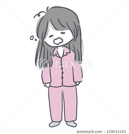 A woman yawning after waking up 129014193