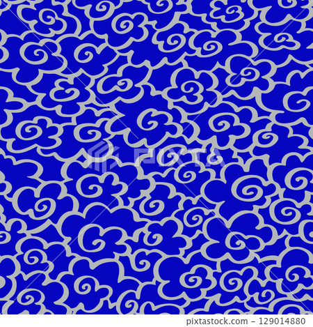 Swirling silver clouds in seamless Asian style pattern on blue, perfect for fabric, wrapping or print design 129014880