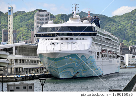 The cruise ship Norwegian Spirit anchored at Kobe Port The cruise ship Norwegian Spirit anchored at Kobe Port 129016086