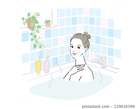A beautiful woman taking a comfortable bath 129016399