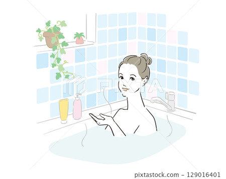 一位美麗的女人舒服地沐浴 一位美麗的女人舒服地沐浴 129016401