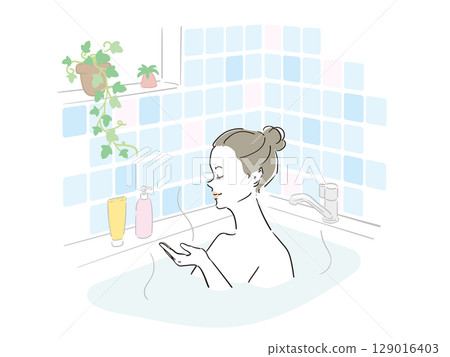 A beautiful woman taking a comfortable bath A beautiful woman taking a comfortable bath 129016403