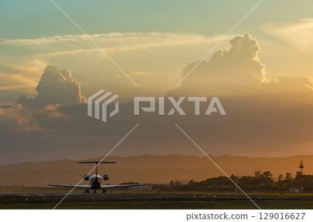 Sendai Airport at dusk, airplane taking off, Natori City, Miyagi Prefecture Sendai Airport at dusk, airplane taking off, Natori City, Miyagi Prefecture 129016627