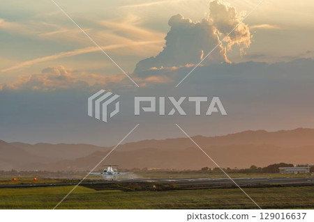 Sendai Airport at dusk, airplane landing, Natori City, Miyagi Prefecture 129016637