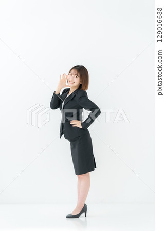 Business woman, young woman, whole body, shouting Business woman, young woman, whole body, shouting 129016688