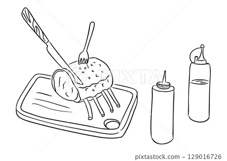 Rack of ribs on cutting board with fork and knife, next to sauce bottles 129016726