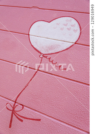 Photo spot: Cute heart balloons painted on the pink wall 129016949