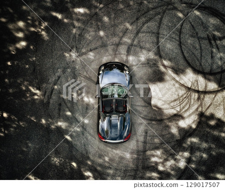 Aerial view of a black convertible Aerial view of a black convertible 129017507