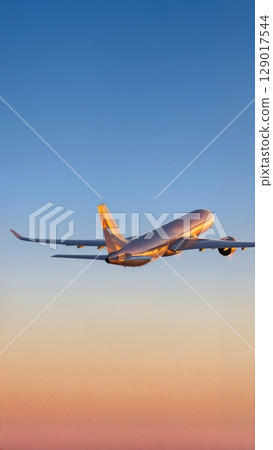 Airplane Takeoff, Dynamic Start, Ascent, Momentum. Ideal for motivational content, business launch, sports themes, vertical shot 129017544