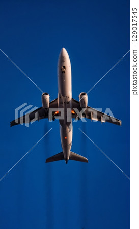 Airplane Takeoff, Dynamic Start, Ascent, Momentum. Ideal for motivational content, business launch, sports themes, vertical shot 129017545