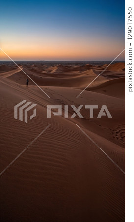 Vast Desert Landscape, Arid Beauty, Solitude, Self-Discovery. Ideal for adventurous travel, artistic expression, introspective journeys 129017550