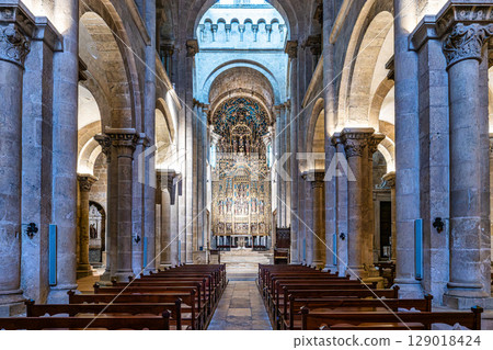 Coimbra , Portugal - Mar 14, 2025: Gothic romanesque cloister of old Coimbra Cathedral, Se Velha de Coimbra in Portugal Coimbra , Portugal - Mar 14, 2025: Gothic romanesque cloister of old Coimbra Cathedral, Se Velha de Coimbra in Portugal 129018424