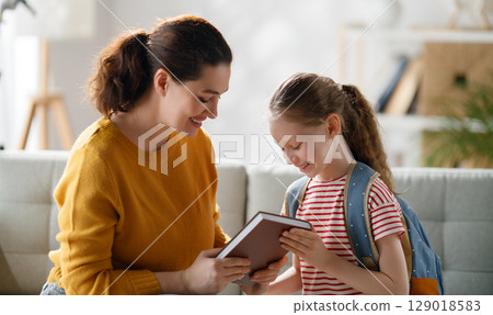 Happy family preparing for school 129018583