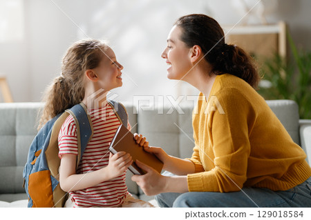 Happy family preparing for school 129018584