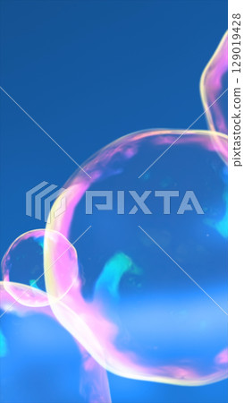 Close-up of colorful iridescent soap bubbles gently floating against a bright blue sky background Close-up of colorful iridescent soap bubbles gently floating against a bright blue sky background 129019428