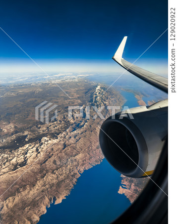 View from the window of an airplane in flight View from the window of an airplane in flight 129020922