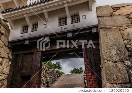 The beautiful castle walls and traditional Japanese architecture of Himeji Castle, a World Heritage Site 129020990
