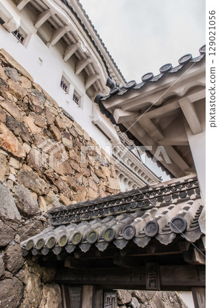 The beautiful castle walls and traditional Japanese architecture of Himeji Castle, a World Heritage Site 129021056