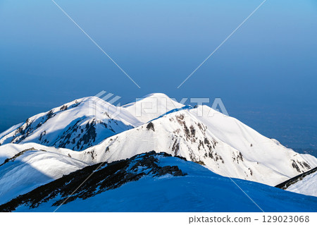 Magic Hour - Morning glow on Mount Oku-Dainichi and Mount Dainichi (view from Mount Betsuyama) - Climbing Mount Tateyama and Mount Betsuyama in the Northern Alps during the remaining snow season 129023068