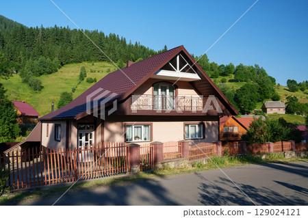 House in a mountain village in the Carpathians. Mountain vacation. 129024121