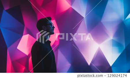 man silhouette against neon geometric background 129024174