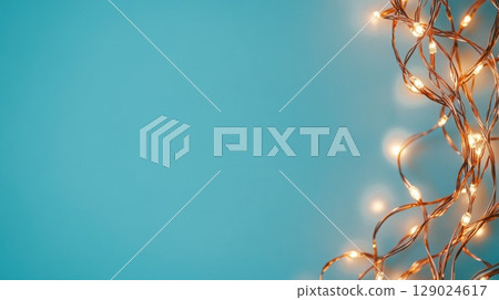 copper string lights on teal background copper string lights on teal background 129024617