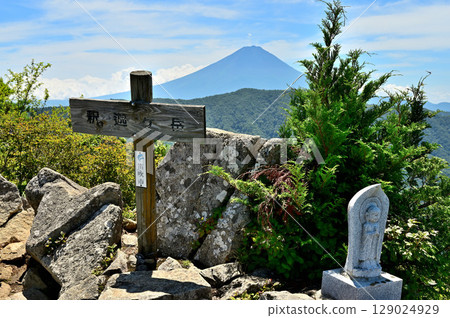 Mt. Fuji in summer as seen from the rocky summit of Mt. Shakagatake in the Misaka Mountains Mt. Fuji in summer as seen from the rocky summit of Mt. Shakagatake in the Misaka Mountains 129024929