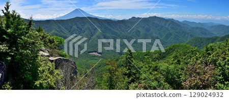 Panoramic view of Mt. Fuji and the Misaka Mountains in summer from the summit of Mt. Shakagatake in the Misaka Mountains 129024932