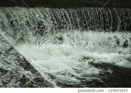 River flooding, rising water, overflowing, overflowing, heavy rain. River flooding, rising water, overflowing, overflowing, heavy rain. 129025055