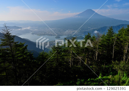 Mount Fuji and Lake Kawaguchi as seen from the second terrace of the Fujiyama Twin Terraces at Shindo Pass in the Misaka Mountains Mount Fuji and Lake Kawaguchi as seen from the second terrace of the Fujiyama Twin Terraces at Shindo Pass in the Misaka Mountains 129025391