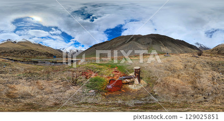 Spherical HDRi panorama of Ak-Suu mineral water well at sunny afternoon in Kyrgyzstan mountains 129025851