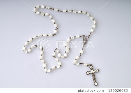 Symbolic antique Catholic Crucifix on white Symbolic antique Catholic Crucifix on white 129026083
