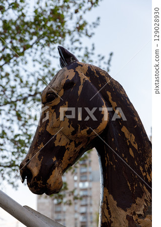 An Artistic Representation of a Horse Head in a City Setting, Captured with Detailed Textures and Unique Color Patterns Creating a Striking Visual Impact An Artistic Representation of a Horse Head in a City Setting, Captured with Detailed Textures and Unique Color Patterns Creating a Striking Visual Impact 129028930
